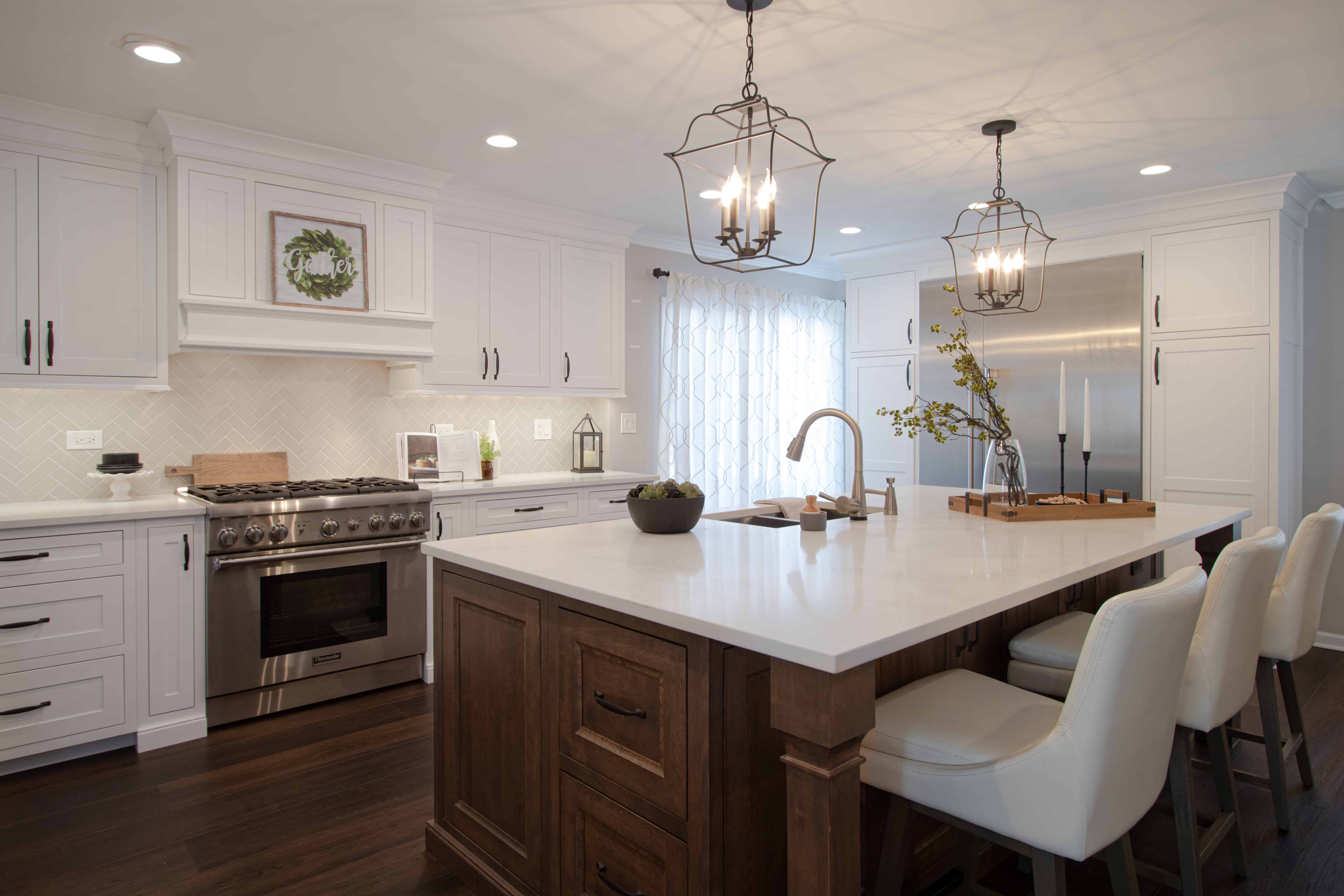 Custom kitchen with inset style cabinetry and large island designed for homeowner in Glenview.